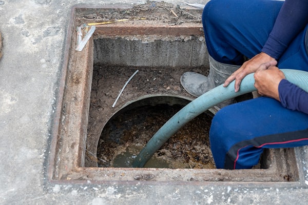 grease trap pumping involves the removal of built-up grease and solids from the trap